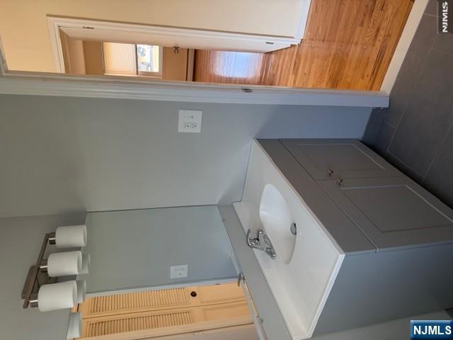 2 Rustic Circle, Unit A Montvale, NJ 07645 - Photo 5 of 7 a bathroom with a sink and a mirror