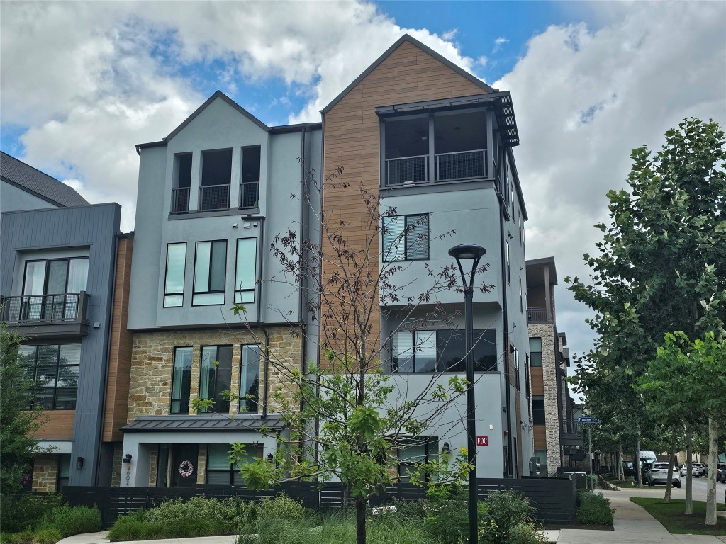 a front view of a house with balcony
