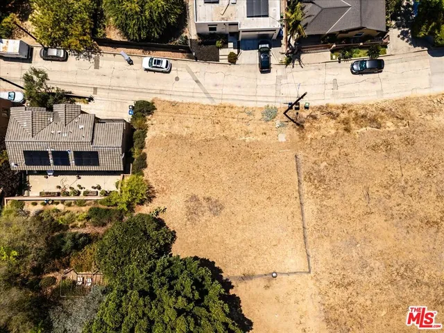 an aerial view of residential house with outdoor space