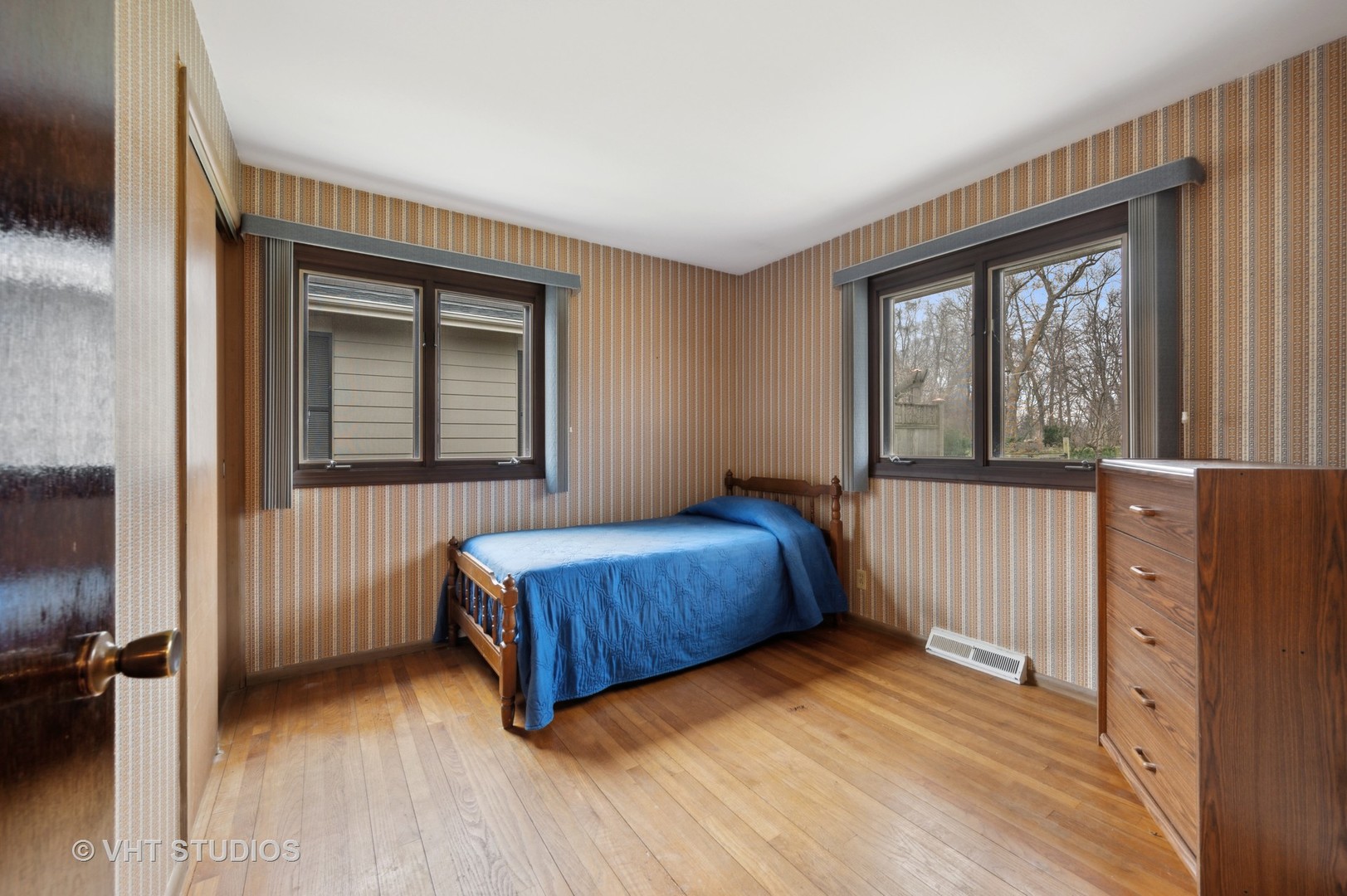 1426 Dunstan Road Geneva, IL 60134 - Photo 11 of 16 a bedroom with a bed and a window