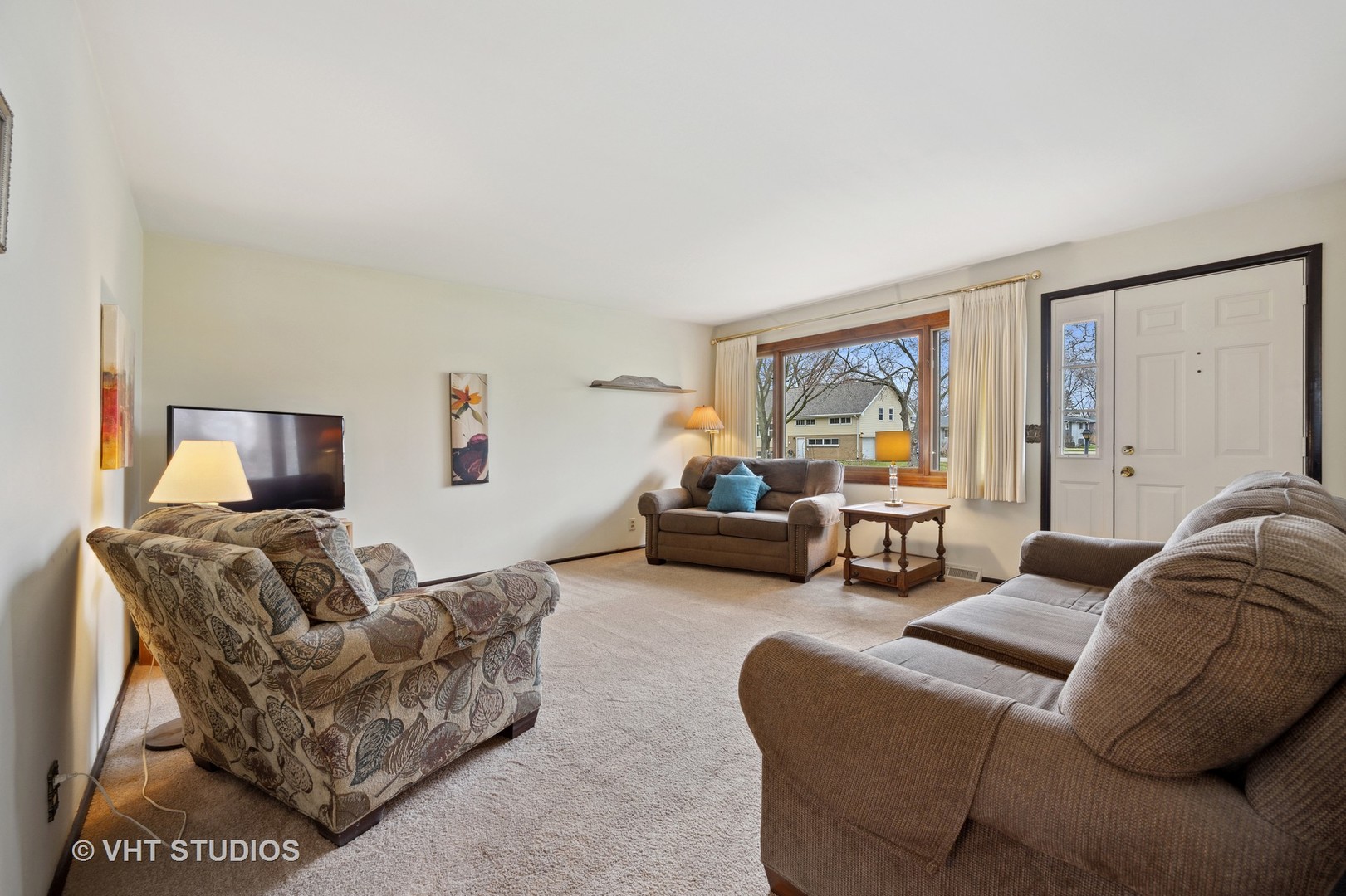 1426 Dunstan Road Geneva, IL 60134 - Photo 2 of 16 a living room with furniture and a large window
