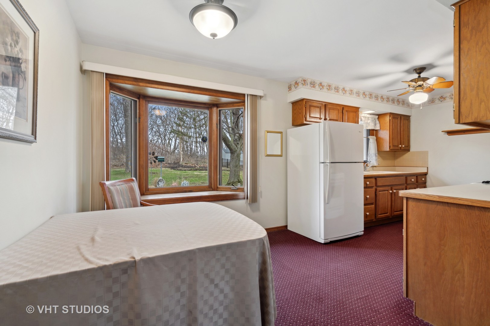 1426 Dunstan Road Geneva, IL 60134 - Photo 4 of 16 a bedroom with a bed and a large window