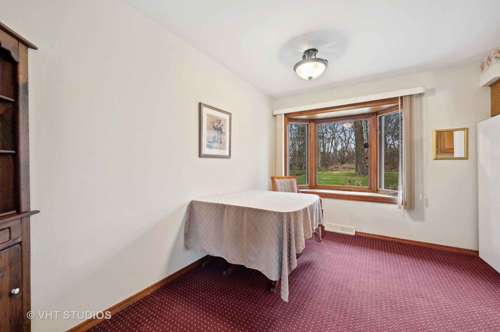 1426 Dunstan Road Geneva, IL 60134 - Photo 5 of 16 a room with window and a wooden floor