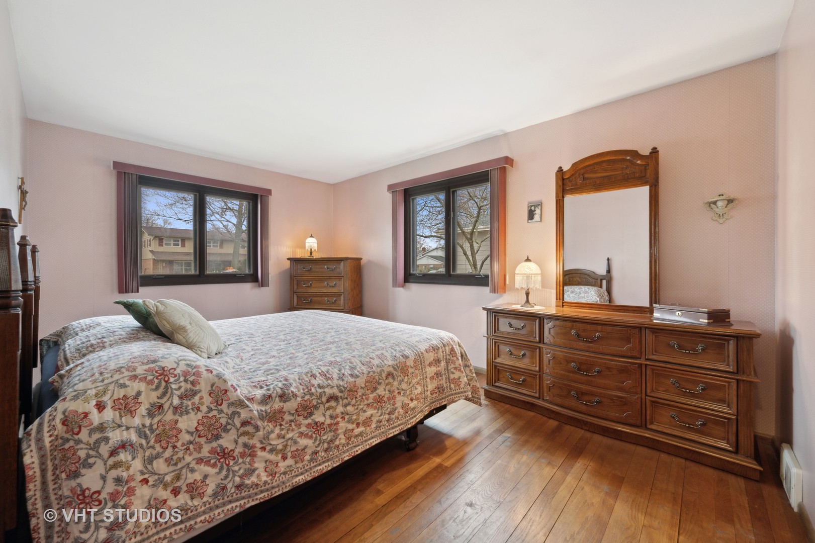 1426 Dunstan Road Geneva, IL 60134 - Photo 8 of 16 a bedroom with a large bed and a dresser