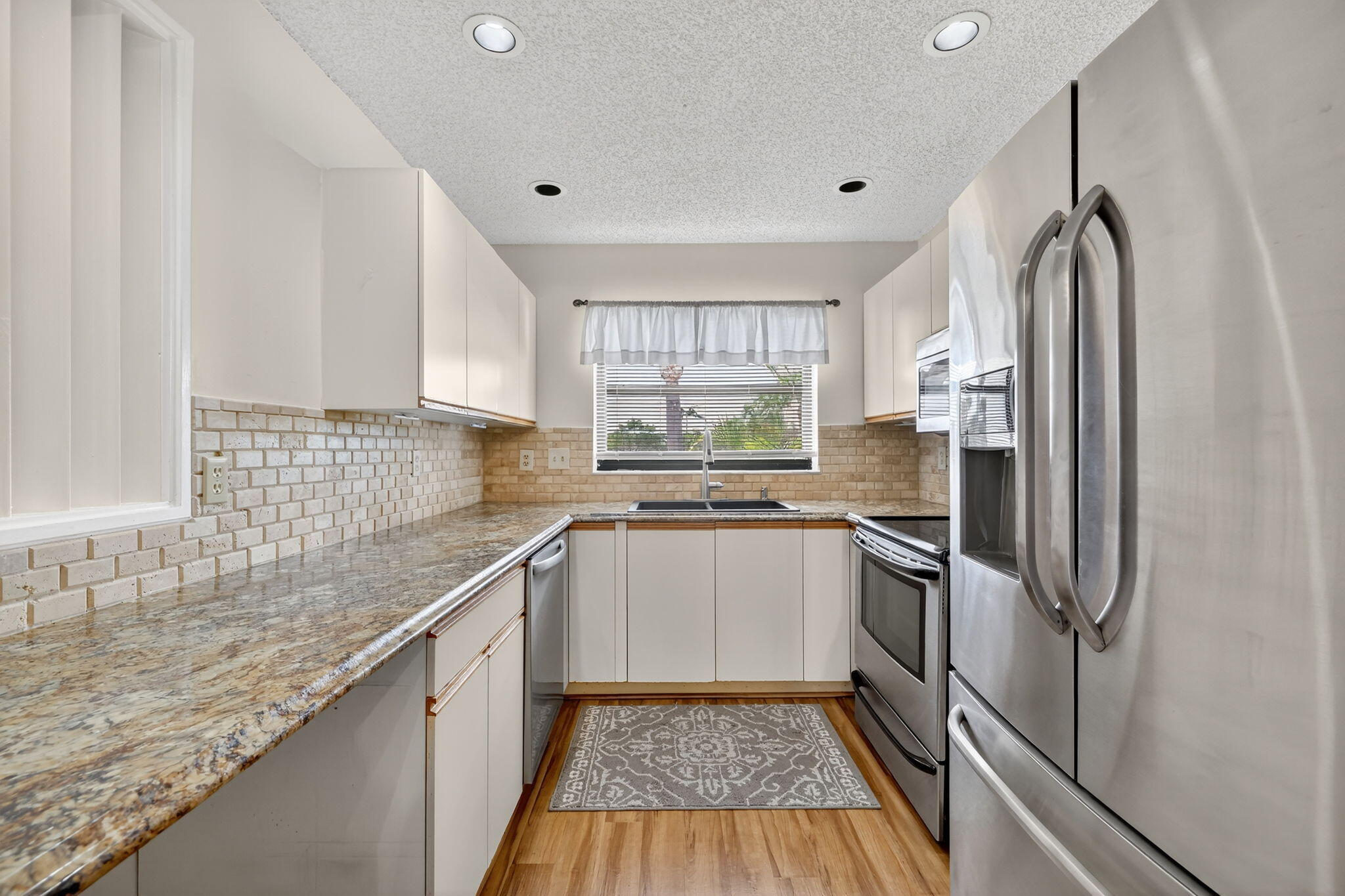 6101 Southeast Landing Way, Unit 11 Stuart, FL 34997 - Photo 2 of 55 7-web-or-mls-004_3A5A8049