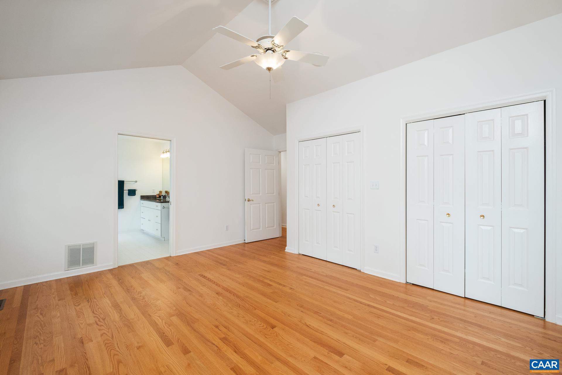 48 Maplevale Drive Palmyra, VA 22963 - Photo 14 of 47 a view of a big room with wooden floor and a chandelier fan