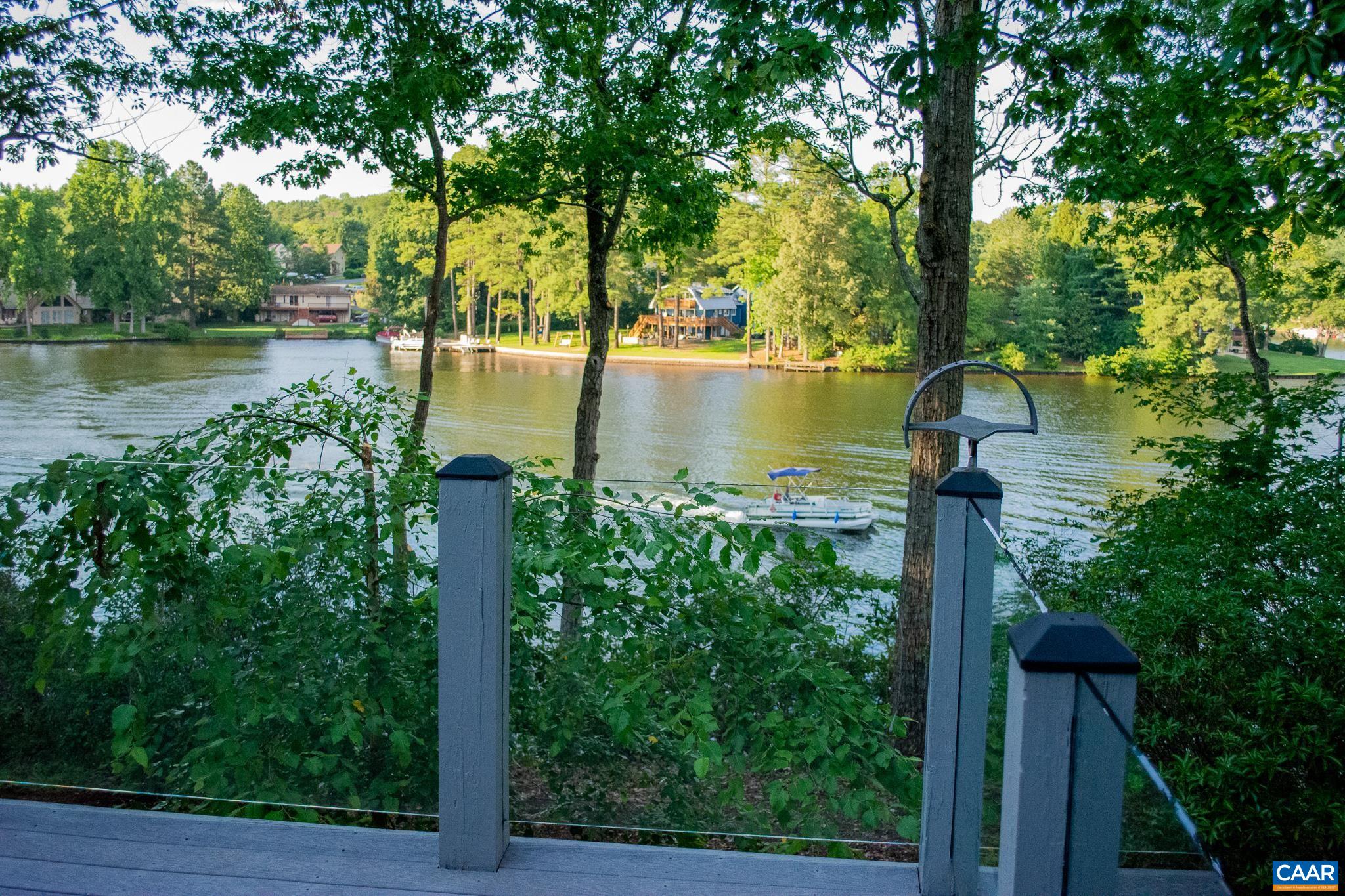 48 Maplevale Drive Palmyra, VA 22963 - Photo 16 of 47 a view of a lake with a house in the background