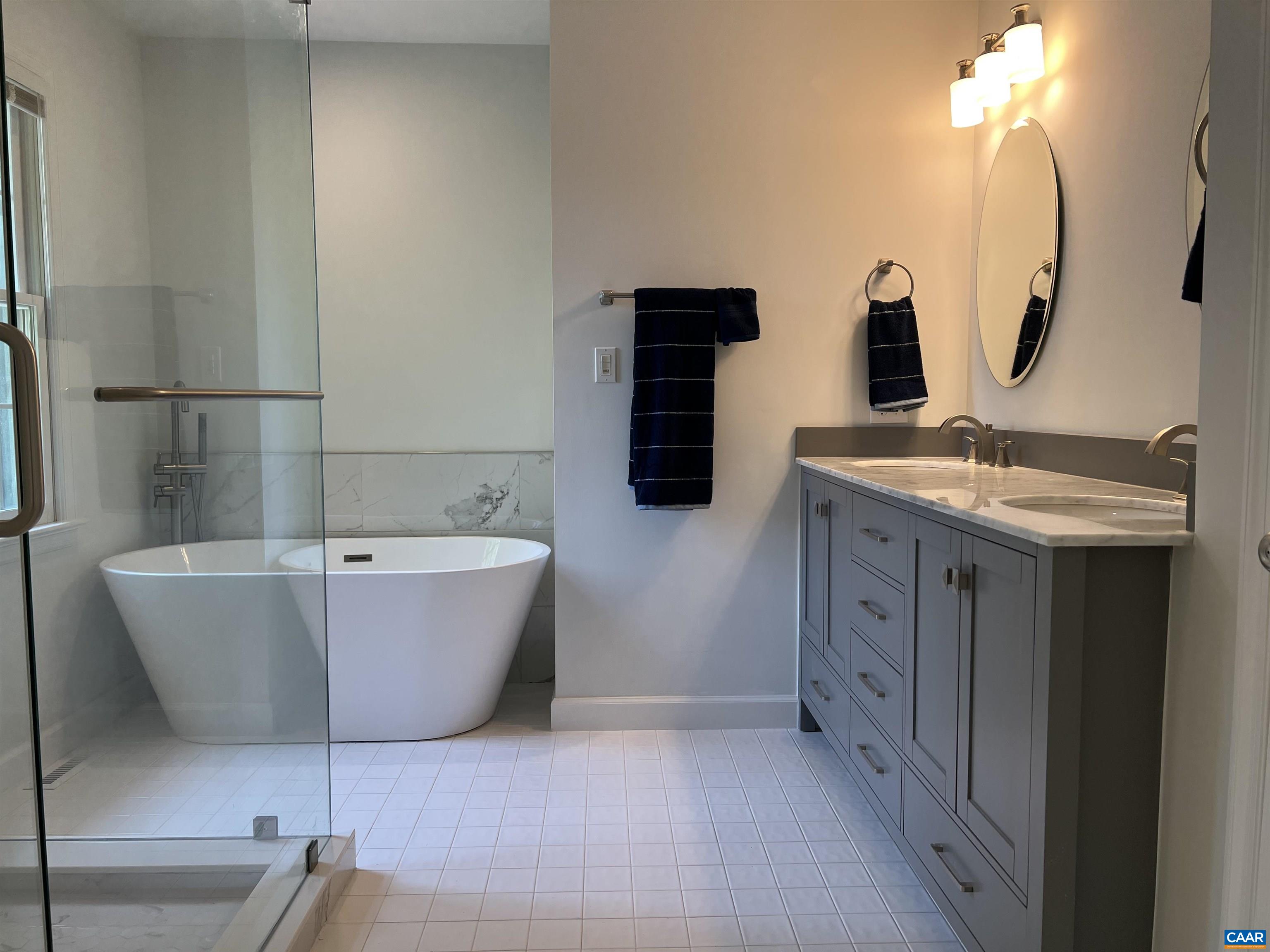48 Maplevale Drive Palmyra, VA 22963 - Photo 22 of 47 a bathroom with a bathtub sink and mirror