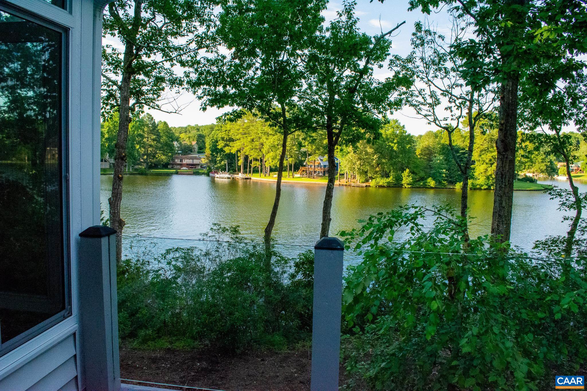 48 Maplevale Drive Palmyra, VA 22963 - Photo 41 of 47 a view of a lake with a house in the background