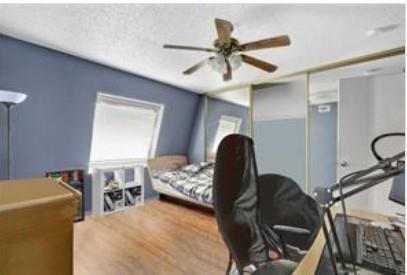 3115 Helms Street, Unit 316 Austin, TX 78705 - Photo 11 of 19 a view of a livingroom with furniture and a ceiling fan