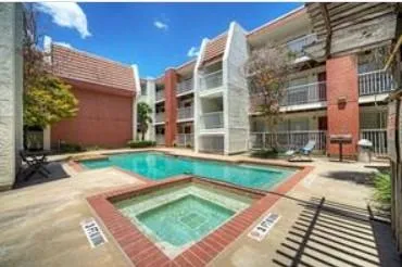 a view of a building with a street