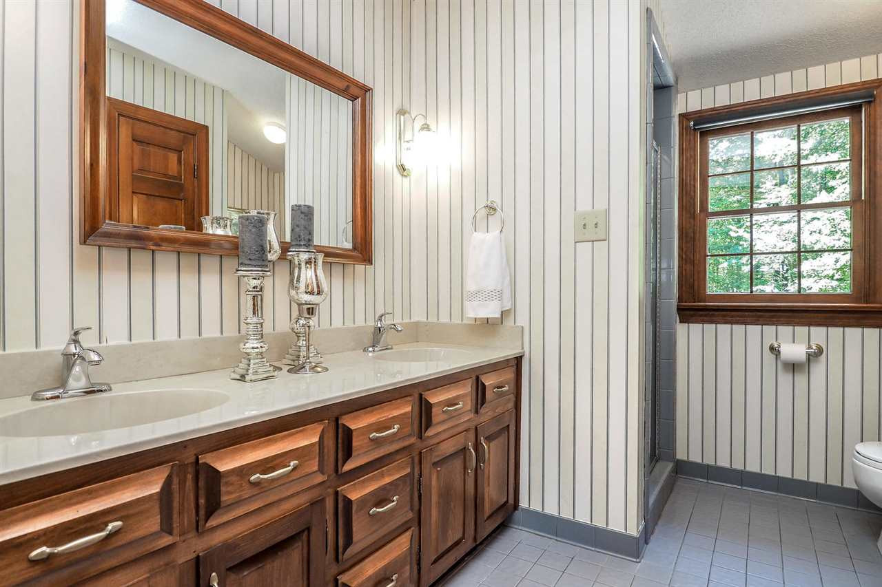 5009 Field And Stream Road Raleigh, NC 27613 - Photo 9 of 12 Master bathroom has GRANITE and DOUBLE vanity! Master Bath/Spa
