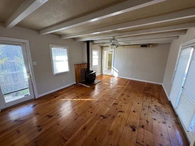 a view of an empty room and window