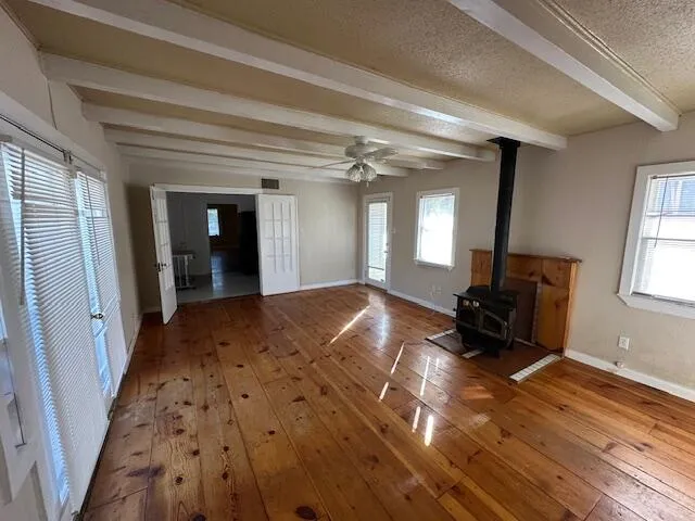 wooden floor in a hall with an entryway