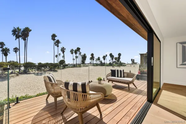 a outdoor living space with furniture and a potted plant