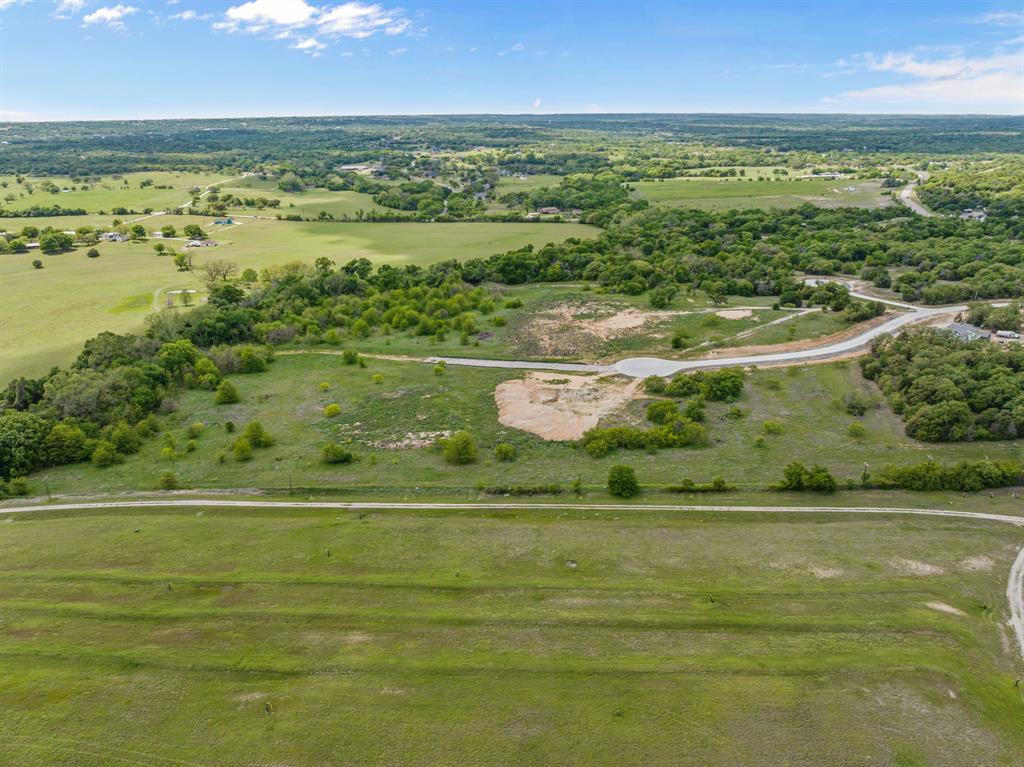 8009 Encanto Way Azle, TX 76020 - Photo 2 of 8 a view of a city with an ocean view