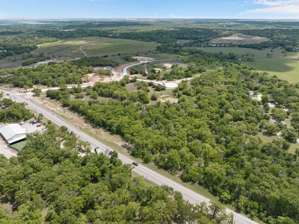 8009 Encanto Way Azle, TX 76020 - Photo 6 of 8 a view of a lake with a mountain