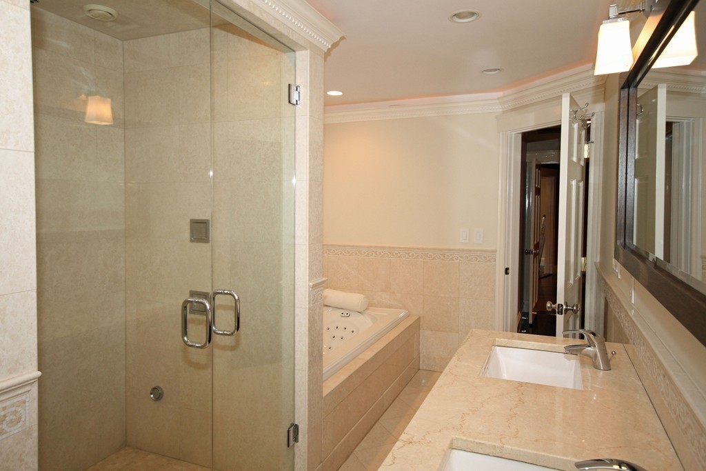 1 Stevens Road Wellesley, MA 02482 - Photo 13 of 18 a bathroom with a tub and a shower