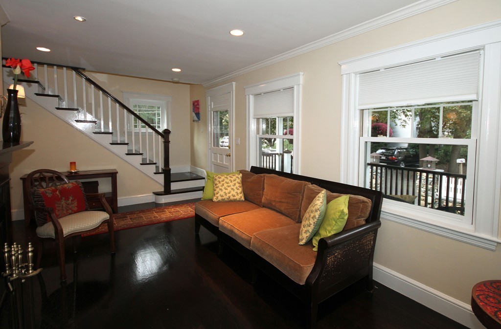 1 Stevens Road Wellesley, MA 02482 - Photo 4 of 18 a living room with furniture and a table with wooden floor