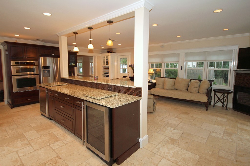 1 Stevens Road Wellesley, MA 02482 - Photo 8 of 18 a large kitchen with a large counter top appliances and cabinets