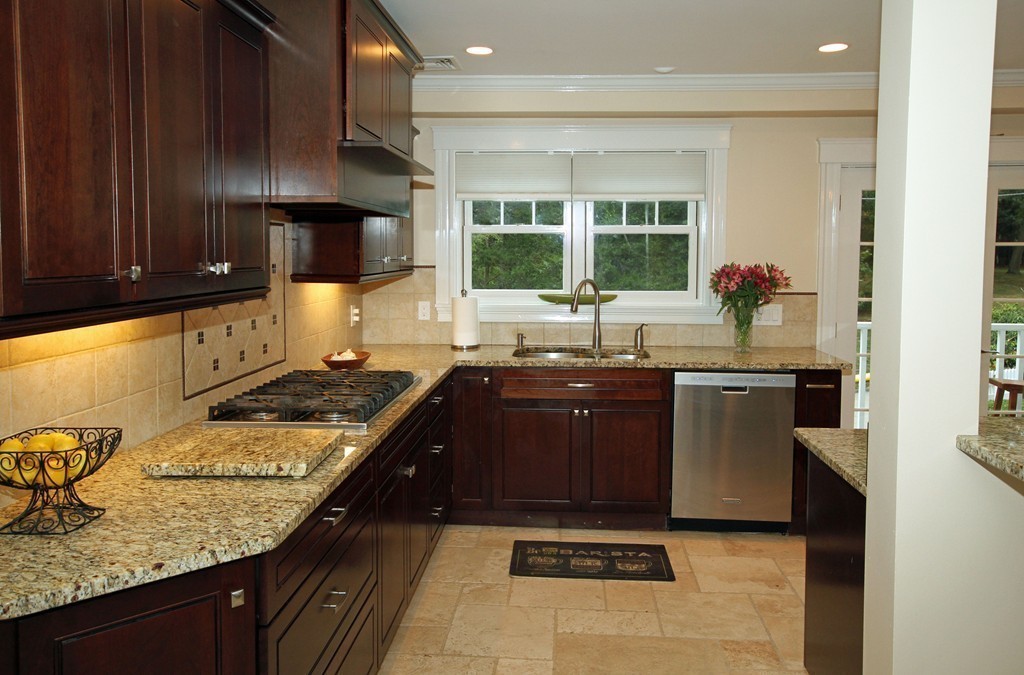 1 Stevens Road Wellesley, MA 02482 - Photo 10 of 18 a kitchen with granite countertop a sink stove and refrigerator