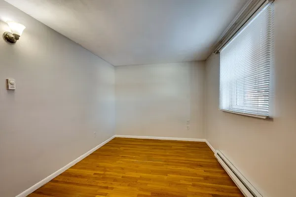 a room with chair and window