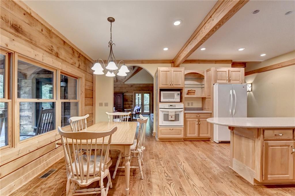 82 Walnut Grove Lane Tiger, GA 30576 - Photo 25 of 88 a view of a dining room with furniture window and wooden floor