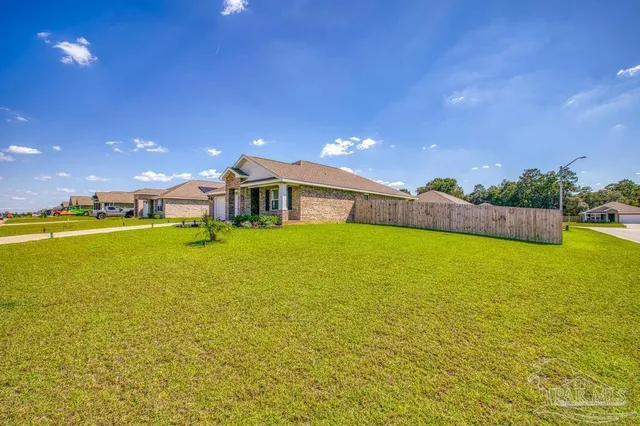 a view of an ocean with a big yard