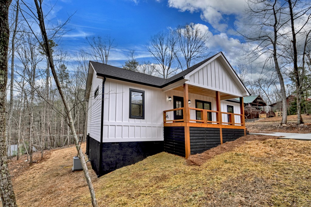 76 Cypress Circle Ellijay, GA 30540 - Photo 30 of 35 a front view of a house with a yard