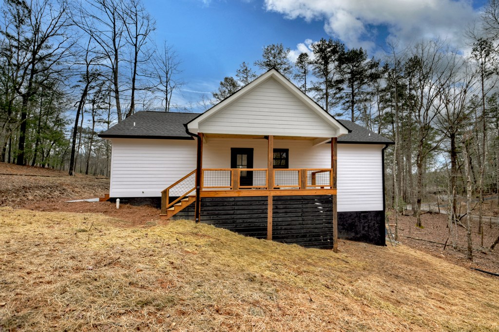 76 Cypress Circle Ellijay, GA 30540 - Photo 33 of 35 a front view of a house with a yard
