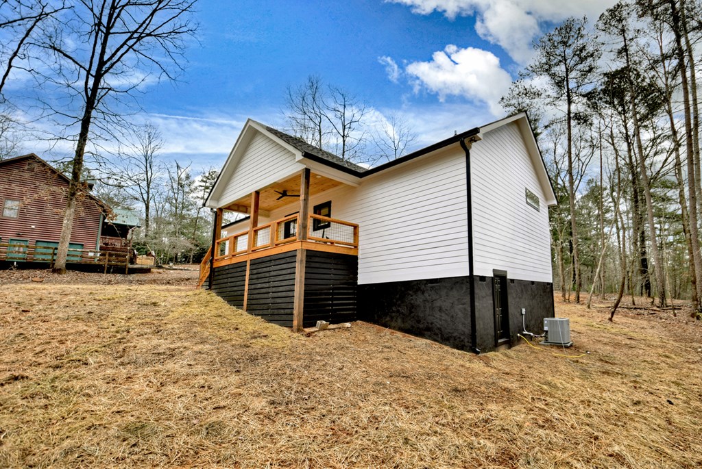 76 Cypress Circle Ellijay, GA 30540 - Photo 34 of 35 a view of a house with a yard