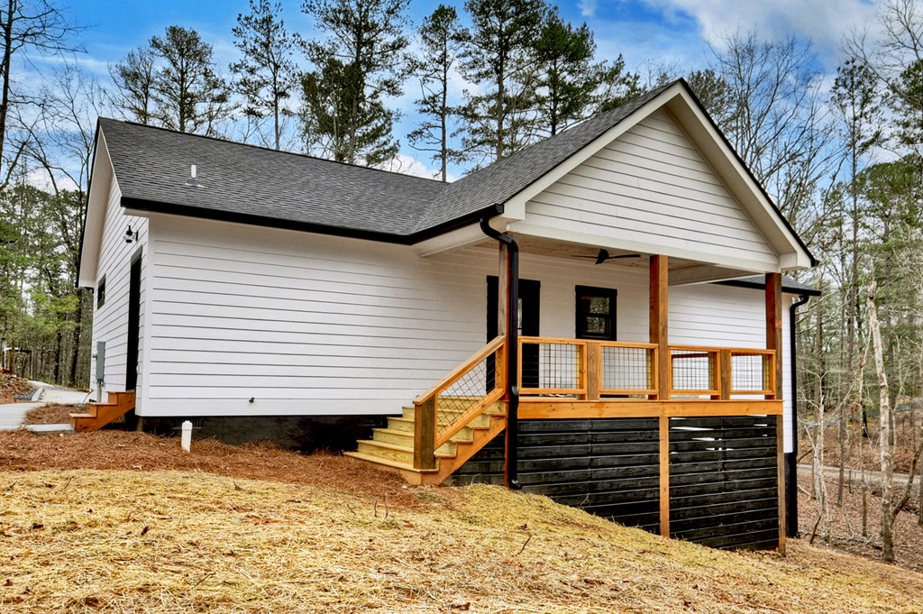 76 Cypress Circle Ellijay, GA 30540 - Photo 4 of 35 a front view of a house with a yard