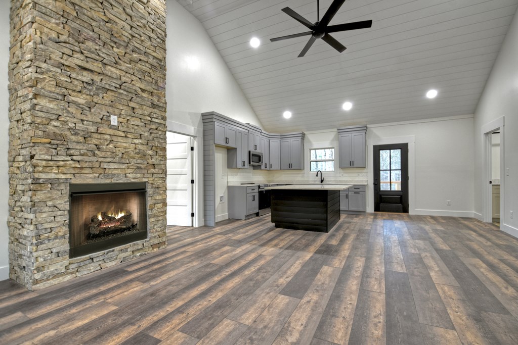 76 Cypress Circle Ellijay, GA 30540 - Photo 10 of 35 a view of kitchen with fireplace and window
