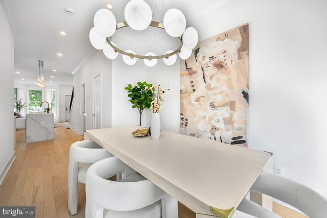 a bathroom with a sink vanity and a mirror