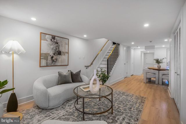 a view of outdoor sitting area with furniture