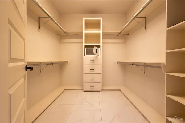 a kitchen with a refrigerator and a sink