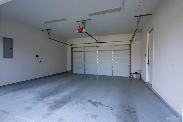 an aerial view of a house with garden