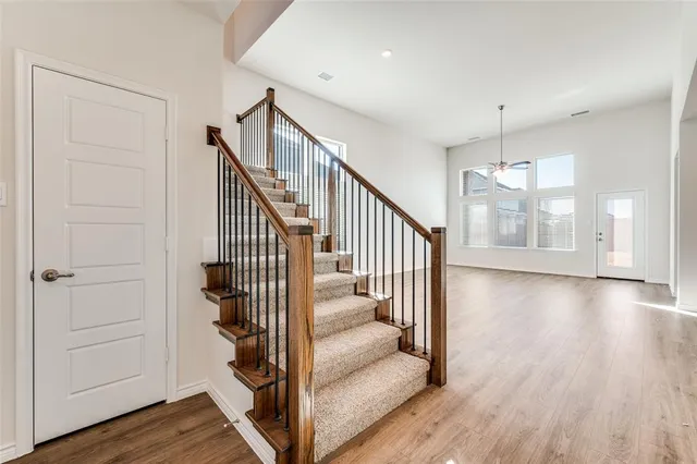 a view of entryway with wooden floor