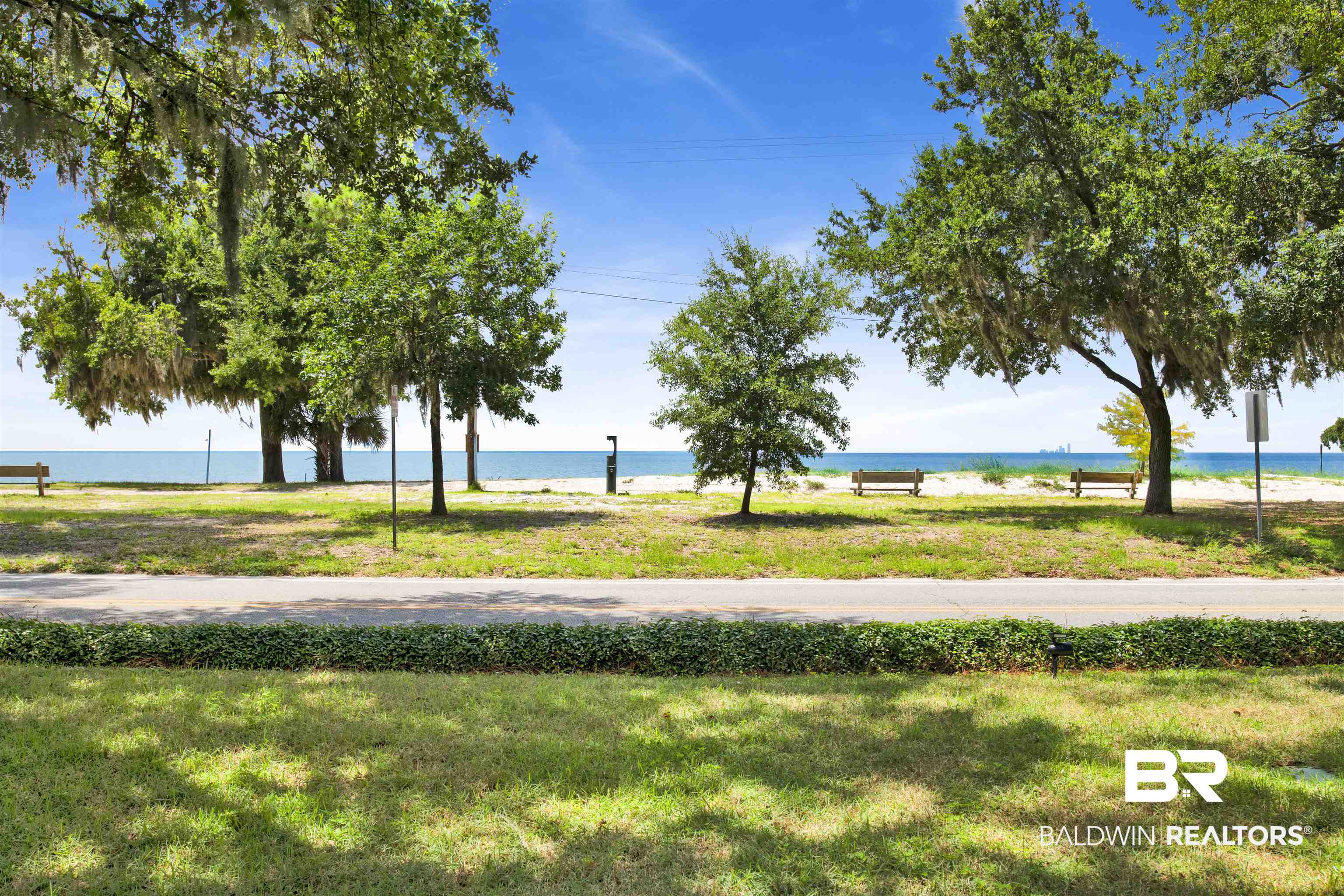 409 South Mobile Street Fairhope, AL 36532 - Photo 43 of 48 View of home's community with a water view and a lawn