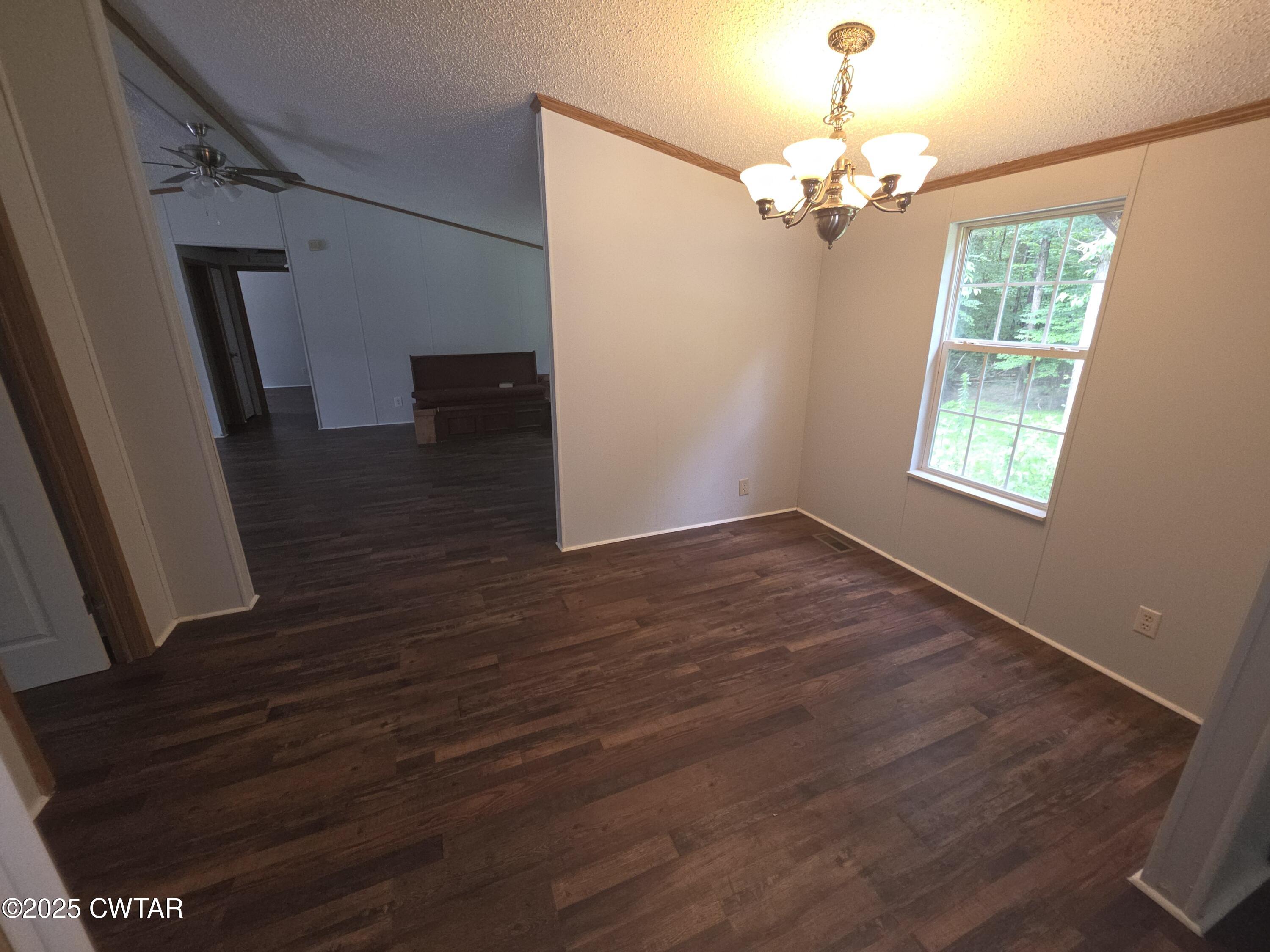 455 Liberty Road Beech Bluff, TN 38313 - Photo 14 of 63 a view of livingroom with hardwood floor and window