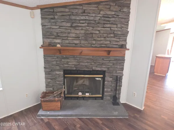 a view of a livingroom with wooden floor
