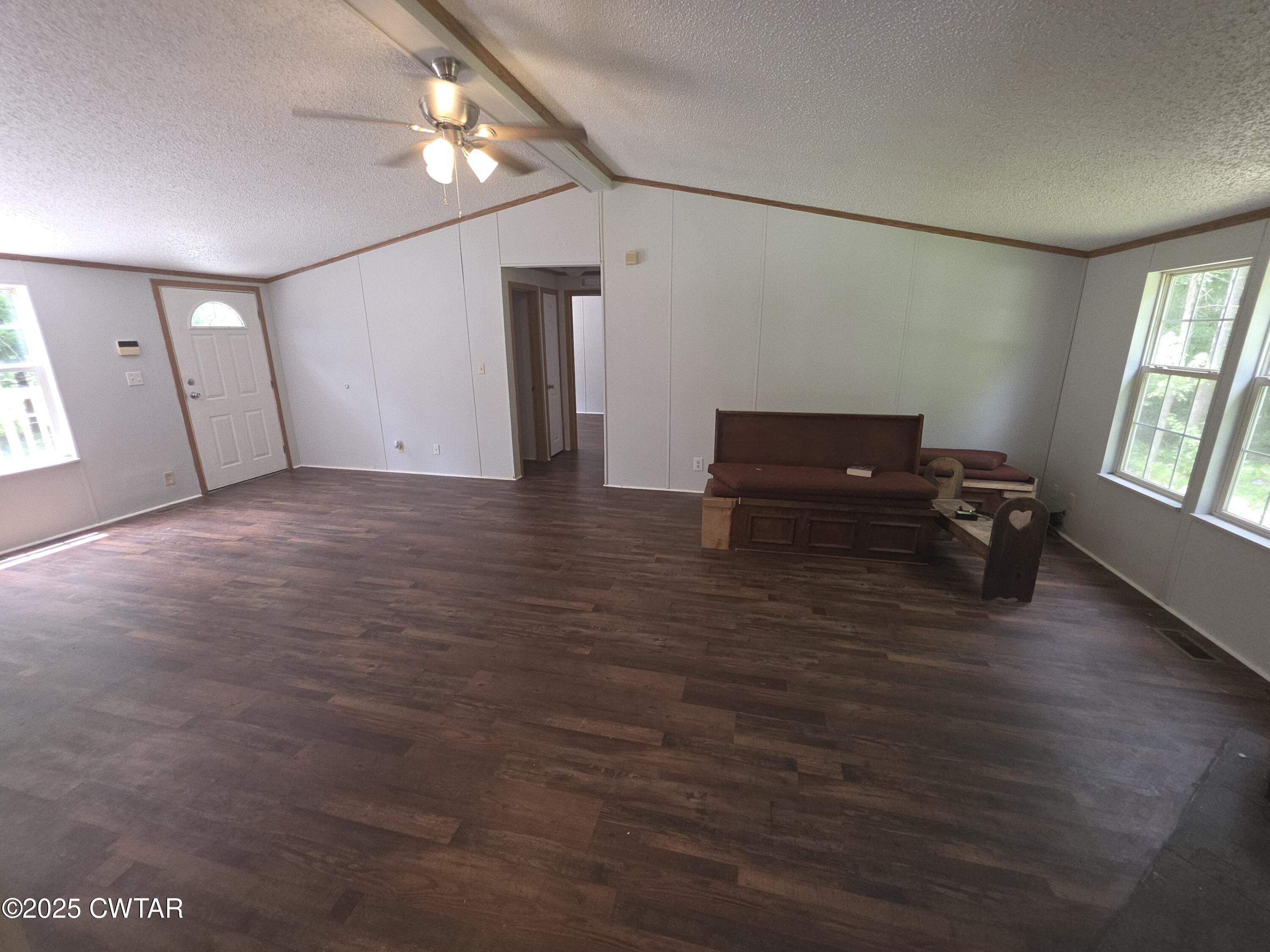 455 Liberty Road Beech Bluff, TN 38313 - Photo 20 of 63 an empty room with windows and cabinet