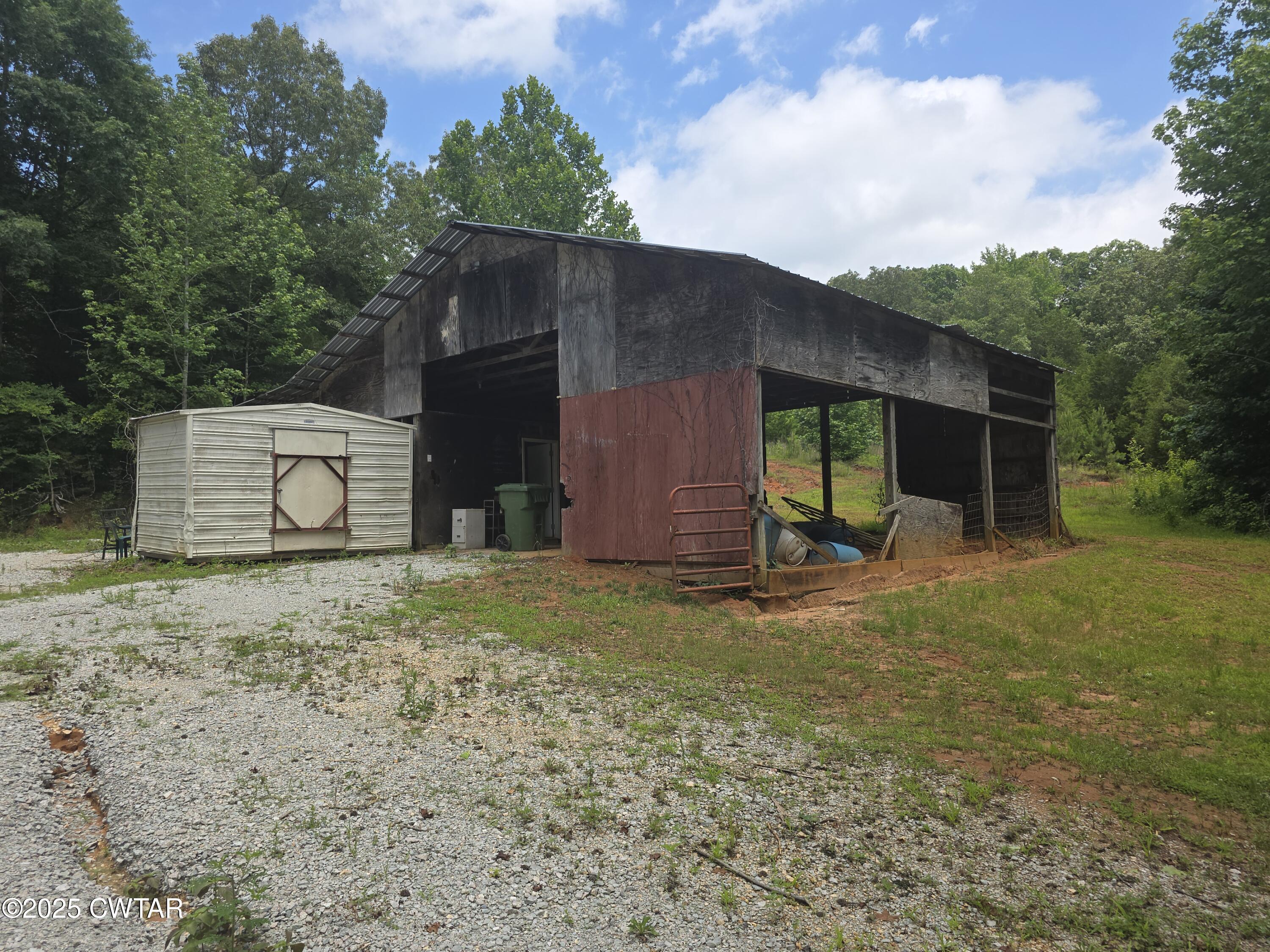 455 Liberty Road Beech Bluff, TN 38313 - Photo 35 of 63 a backyard of a house