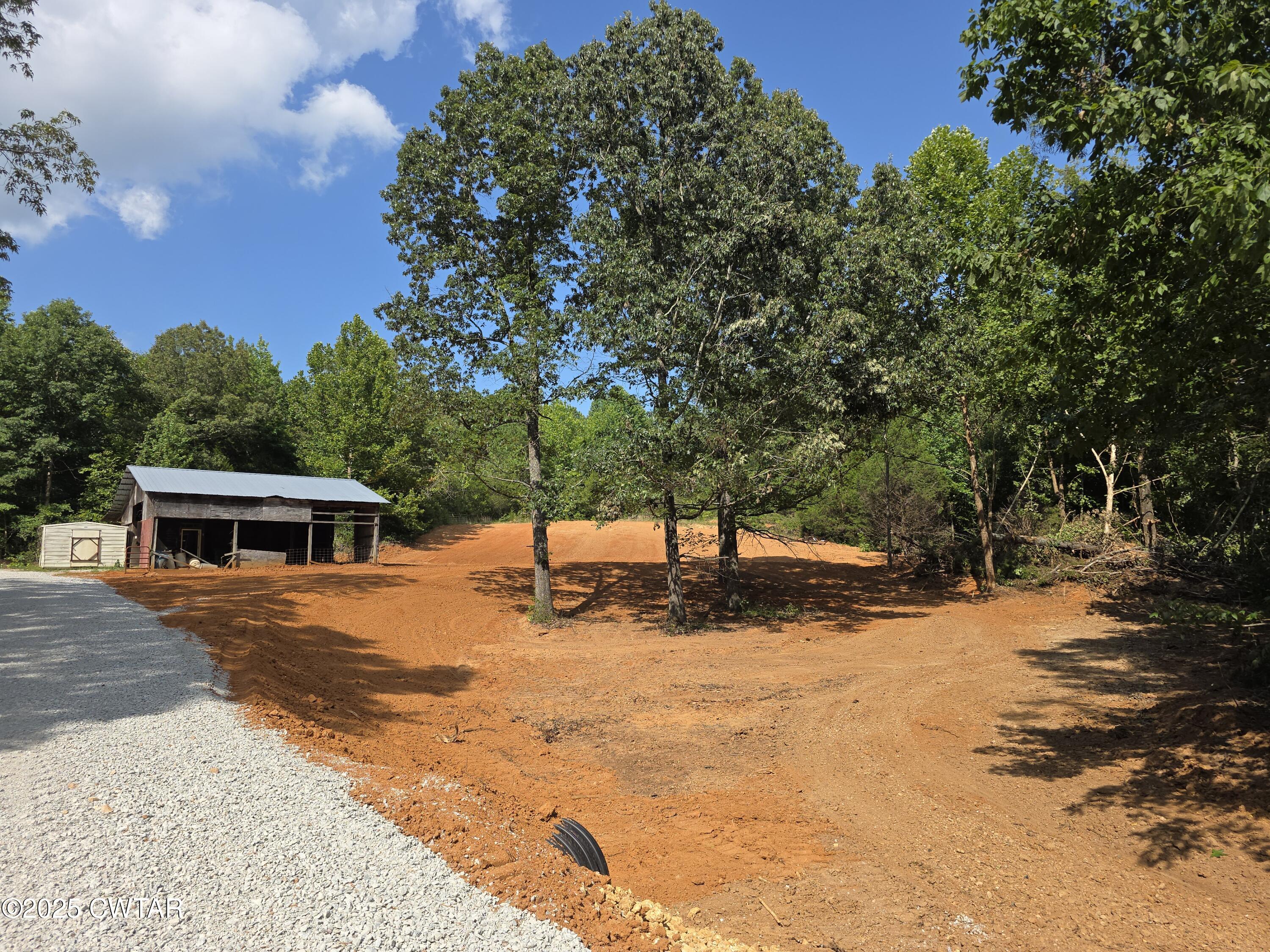 455 Liberty Road Beech Bluff, TN 38313 - Photo 42 of 63 a view of a house with snow on the road