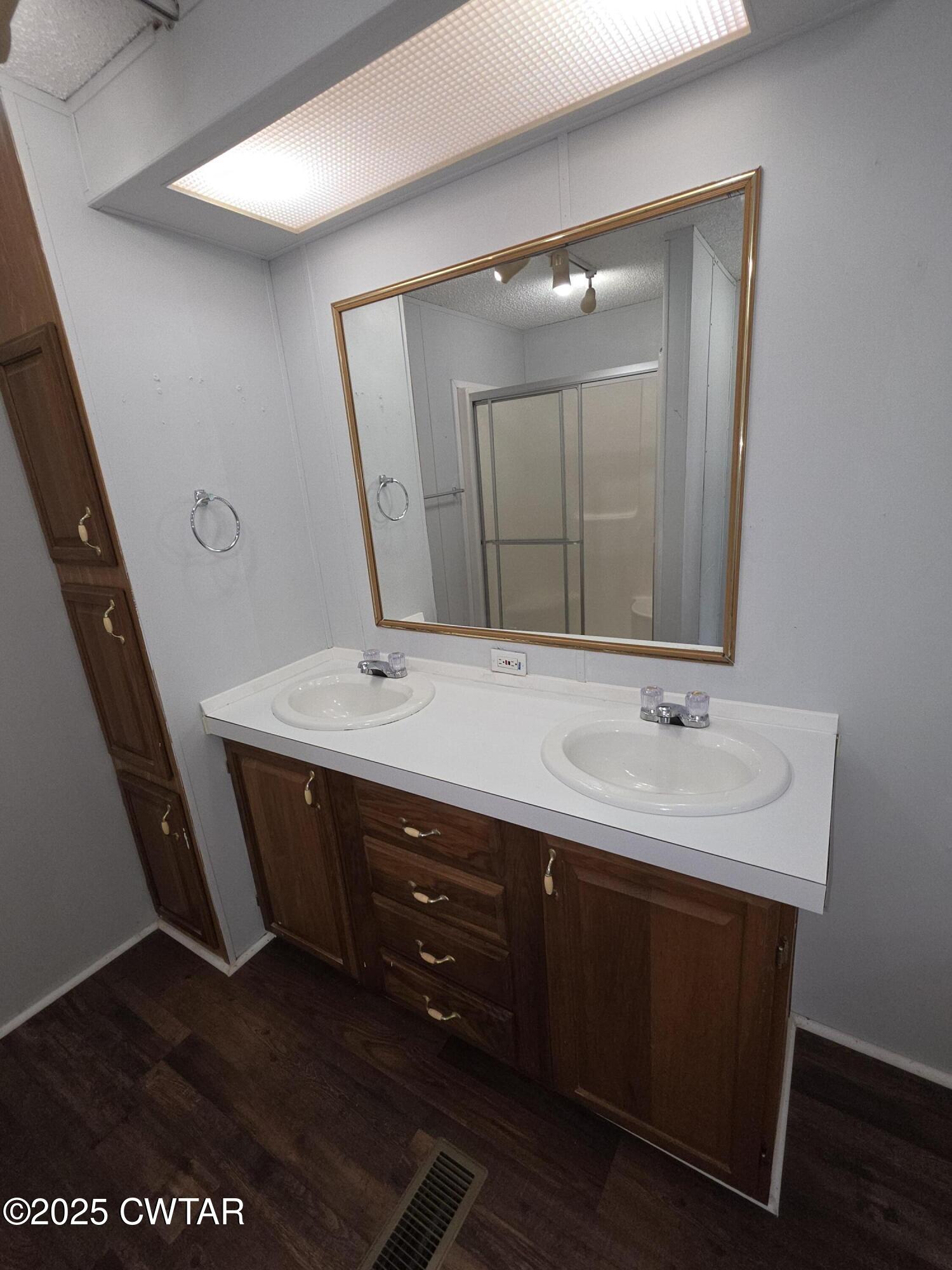 455 Liberty Road Beech Bluff, TN 38313 - Photo 48 of 63 a bathroom with a sink and a mirror