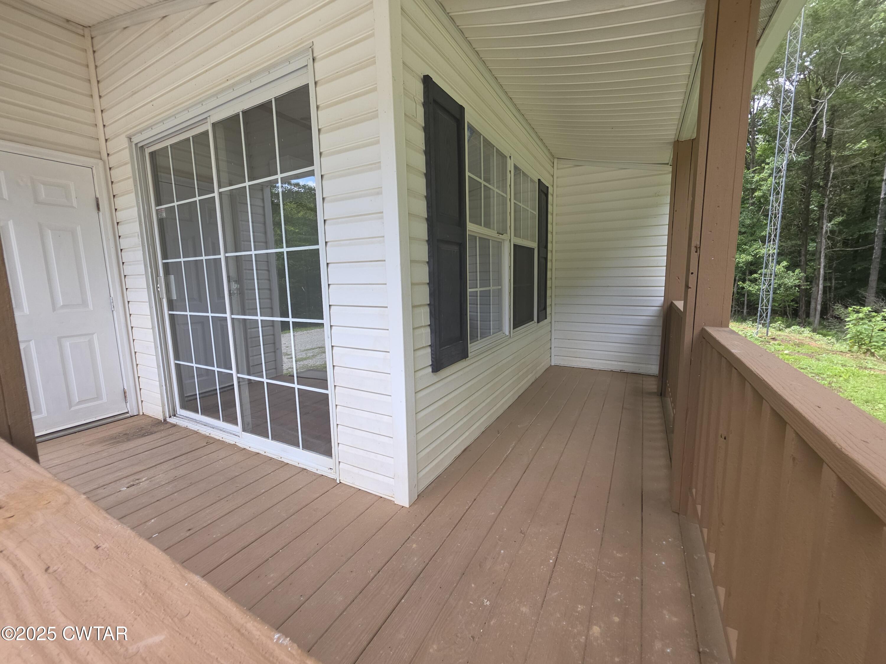 455 Liberty Road Beech Bluff, TN 38313 - Photo 6 of 63 a view of outdoor space with wooden floor and window