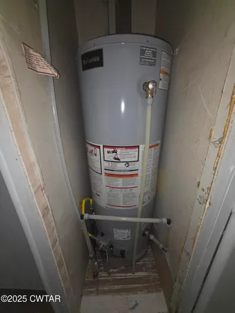 a view of hallway with wooden floor