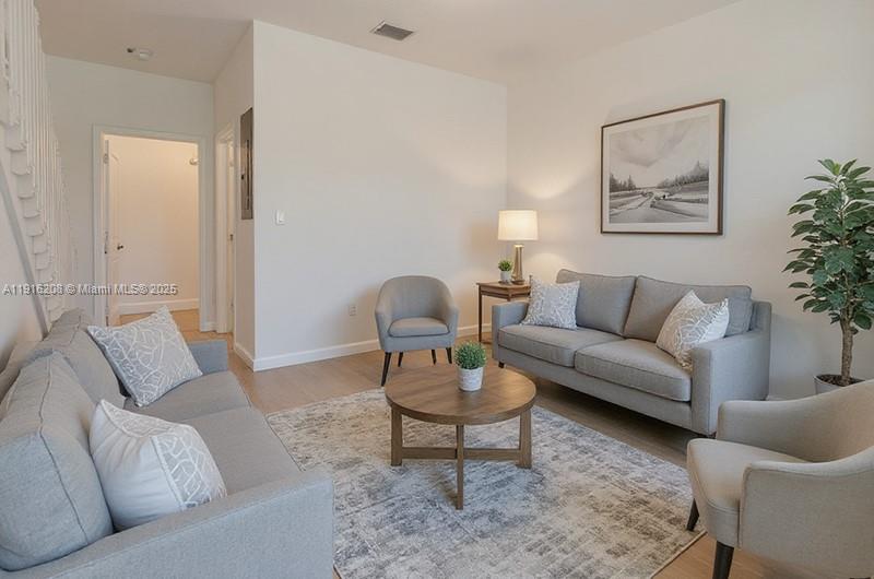 28637 Southwest 132nd Court Homestead, FL 33033 - Photo 13 of 45 a living room with furniture and a couch