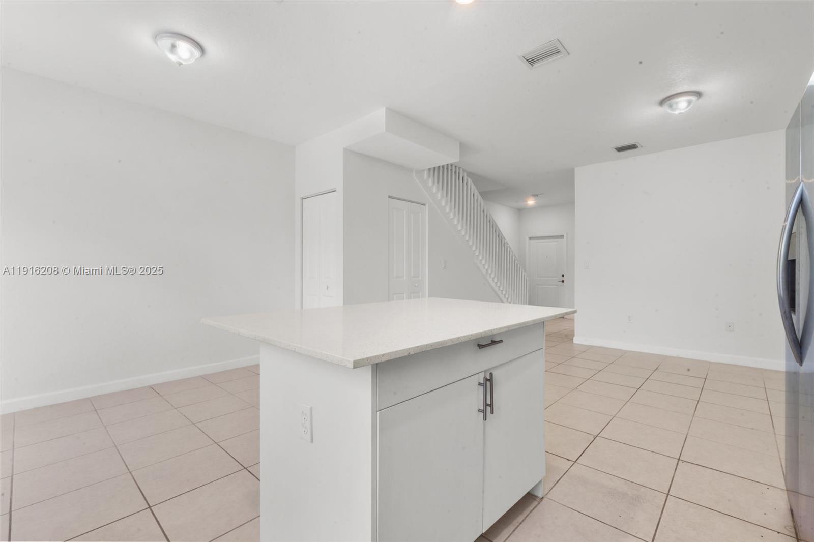 28637 Southwest 132nd Court Homestead, FL 33033 - Photo 21 of 45 an empty room with a sink and a mirror