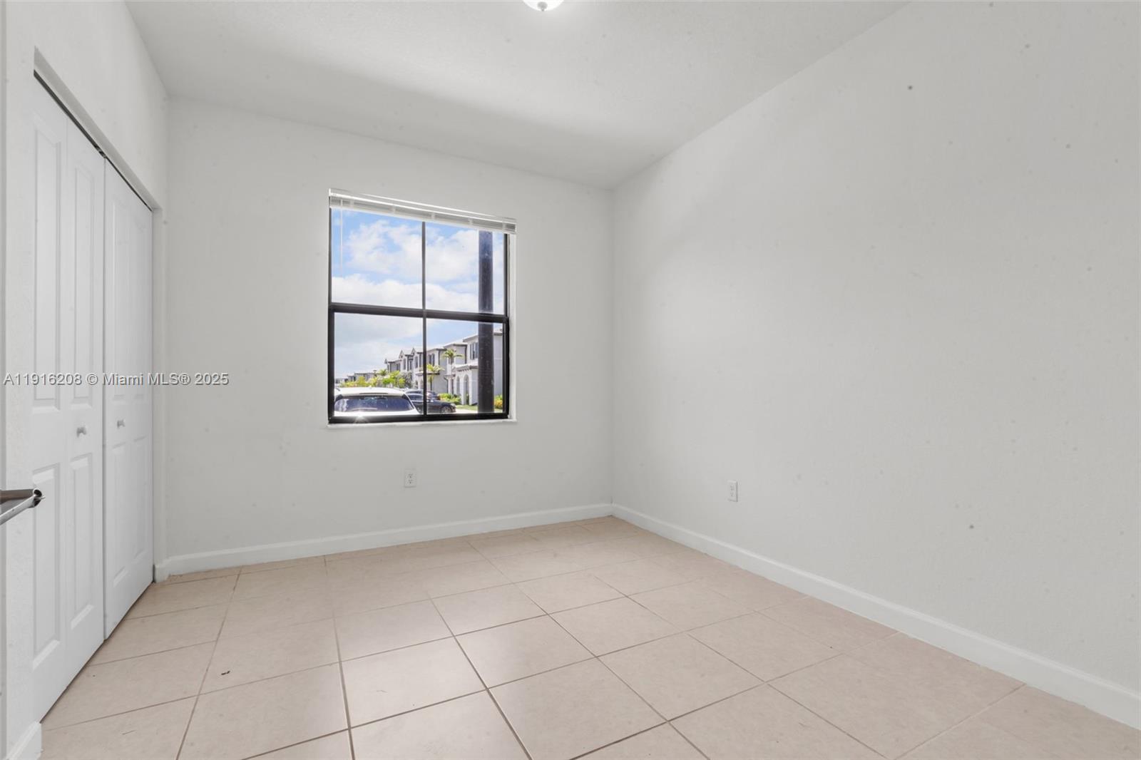 28637 Southwest 132nd Court Homestead, FL 33033 - Photo 24 of 45 an empty room with windows